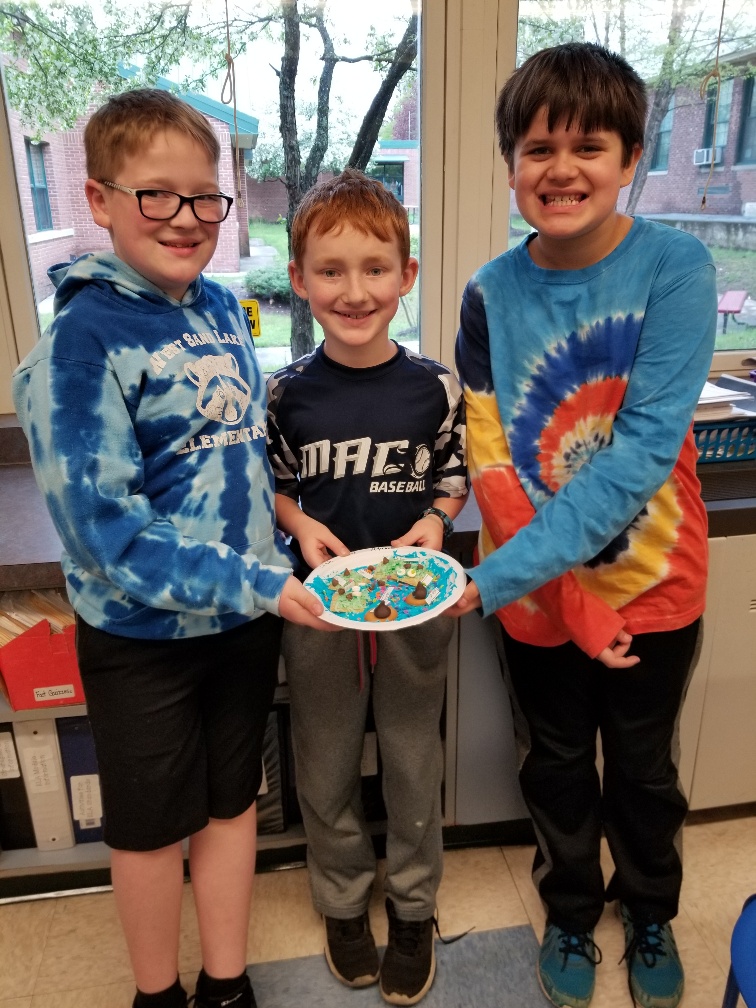 students displaying work