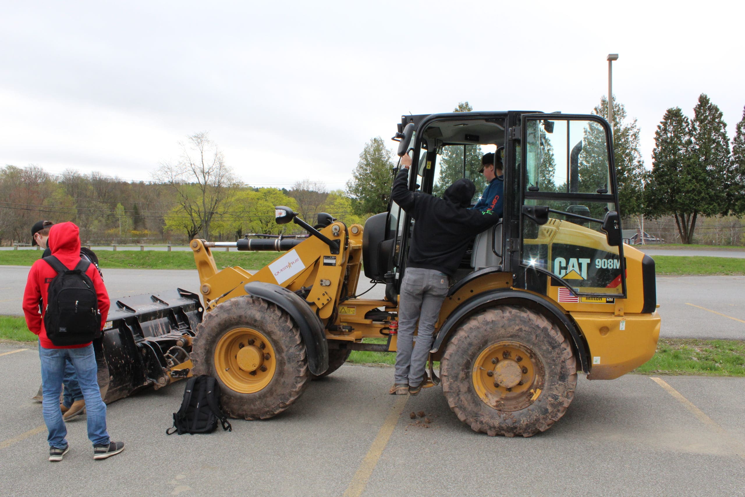 students in a bulldozer