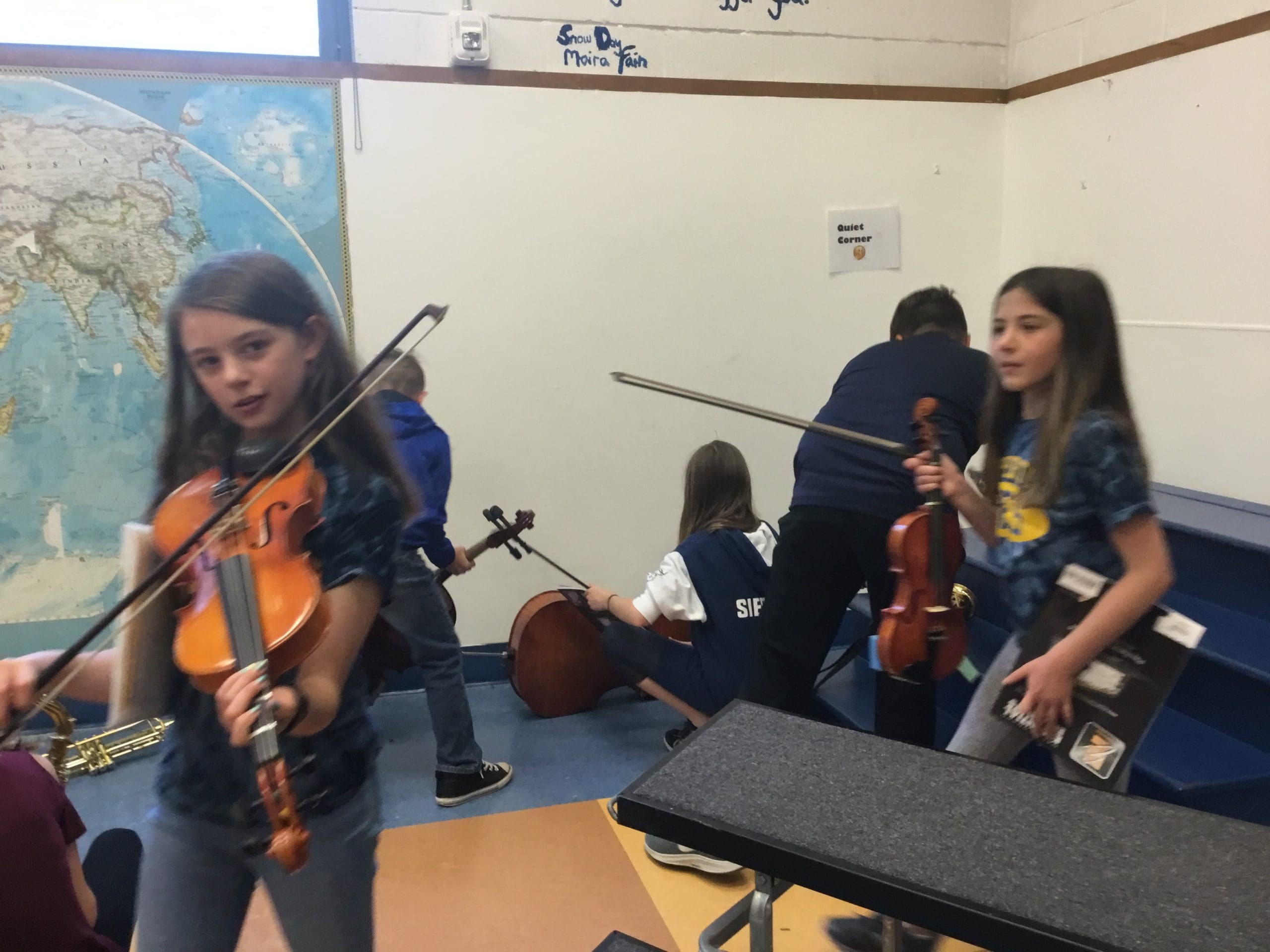 students playing instruments