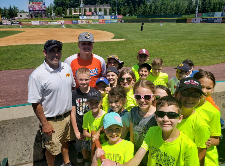 students at a baseball game