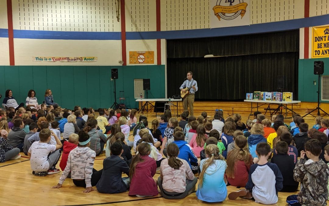 author talking to students