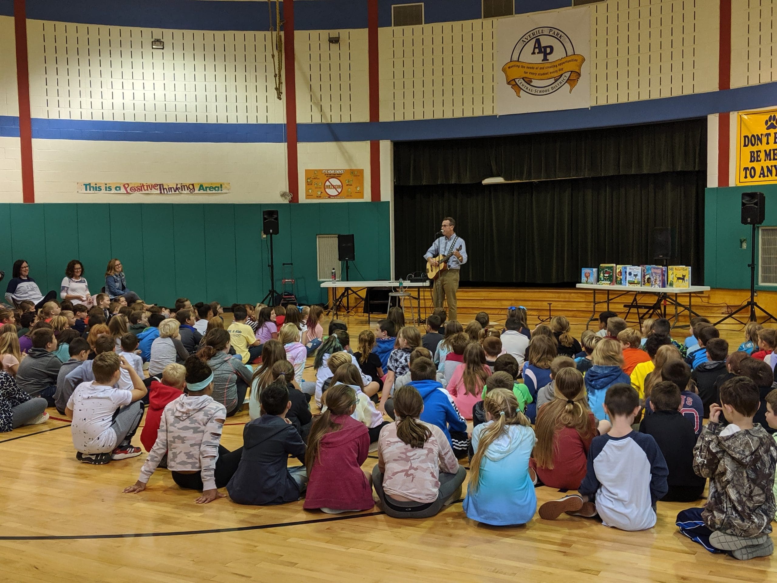 author talking to students