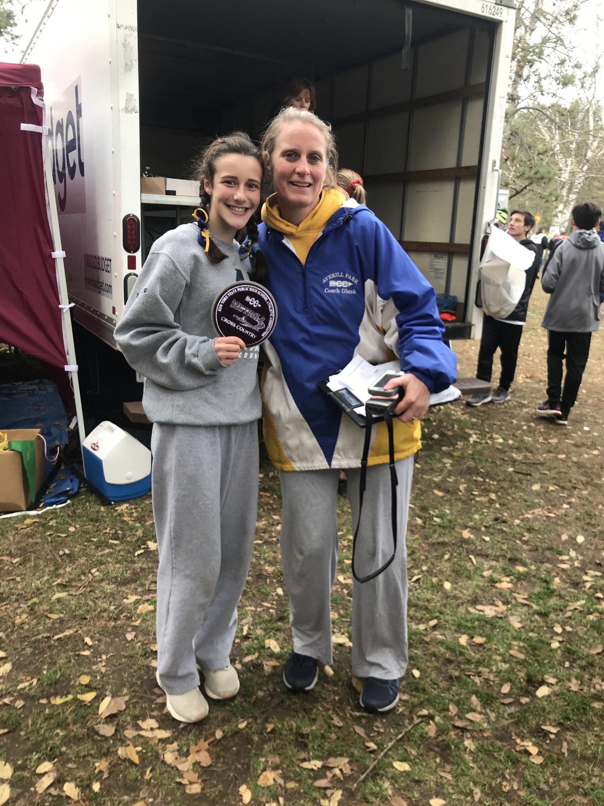 runner with coach