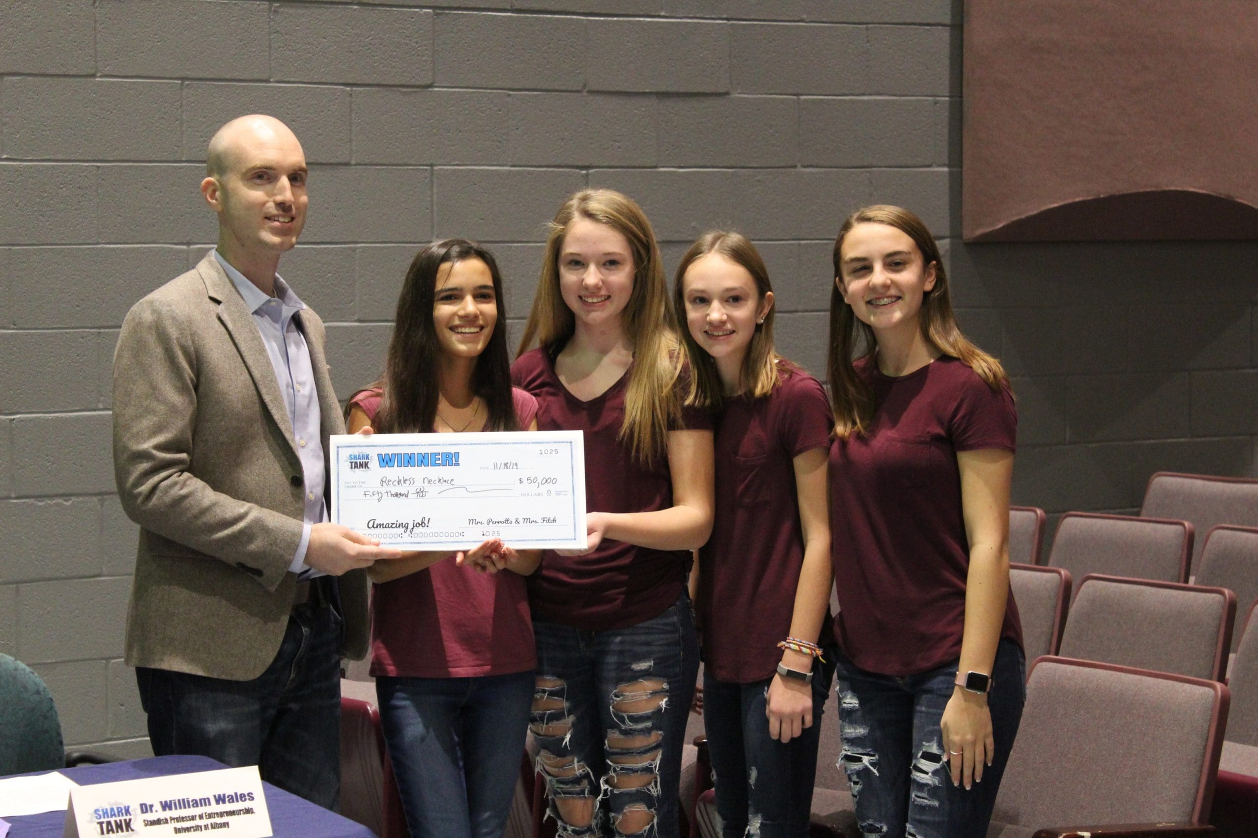 students with fake check