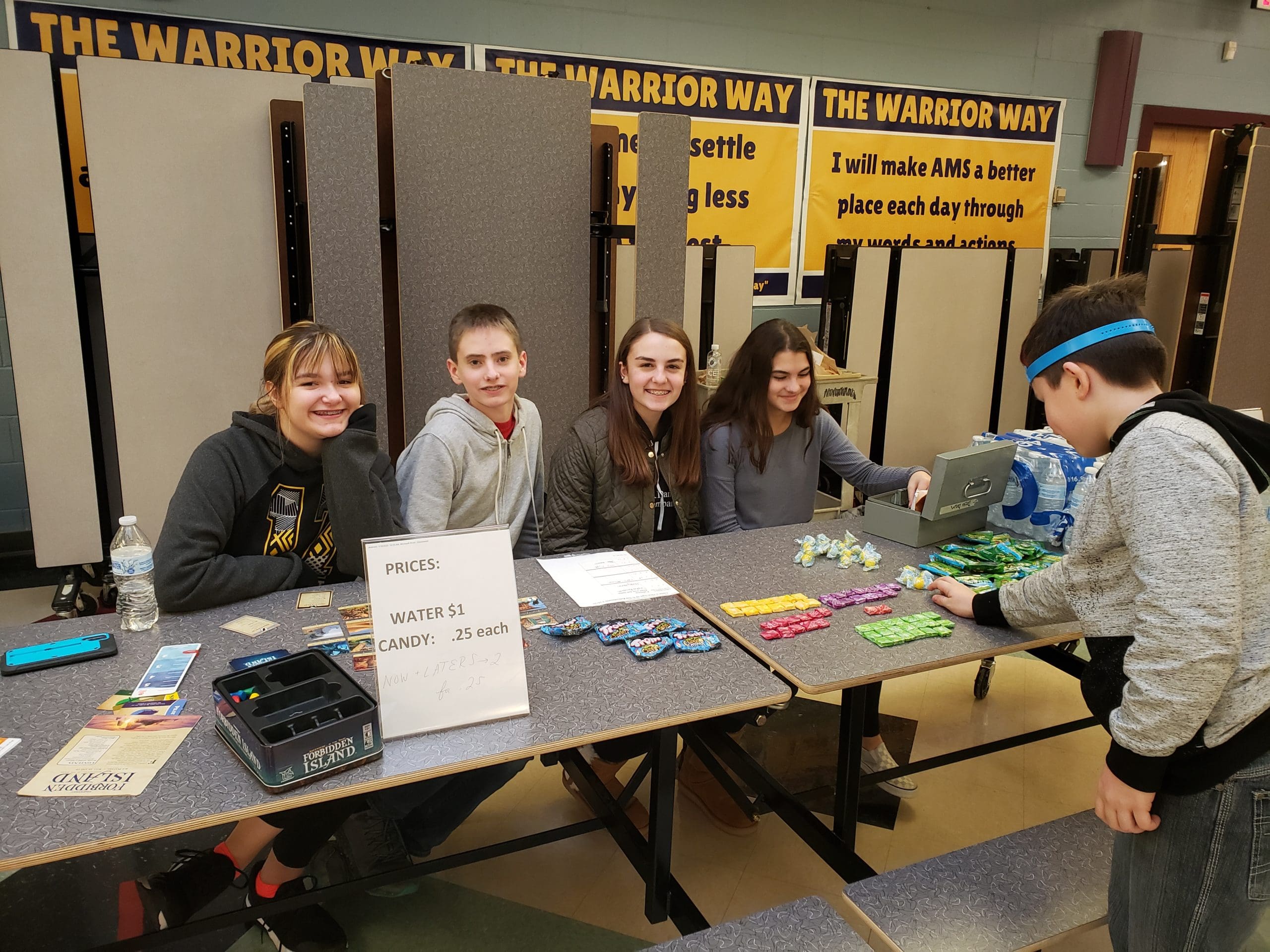 students working the event