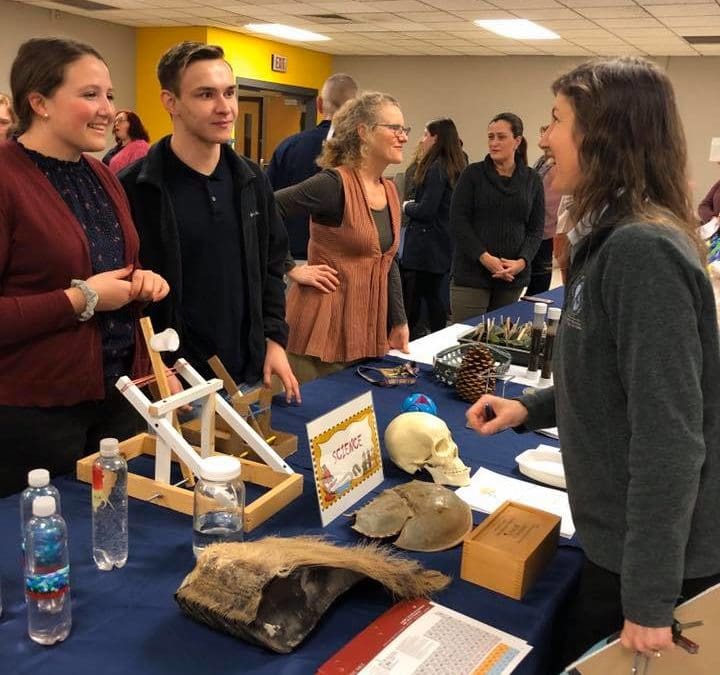 students talking to teachers