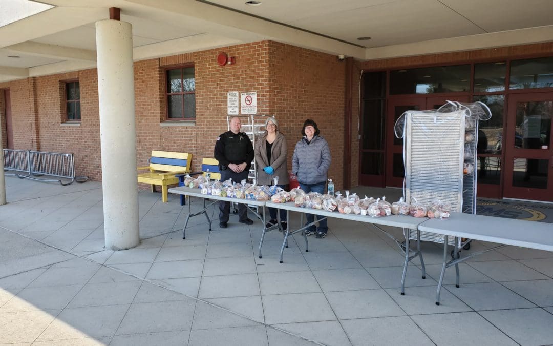 staff with food outside AMS