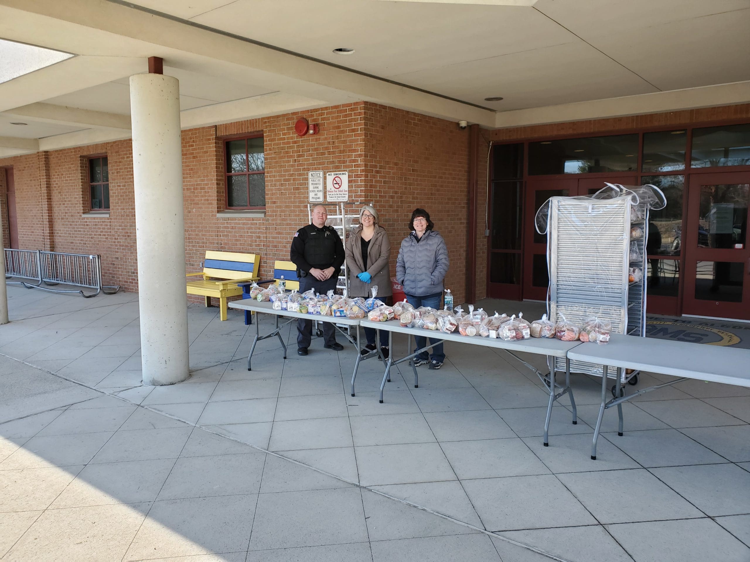 staff with food outside AMS