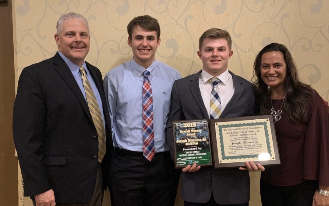 Joe Milanese with awards