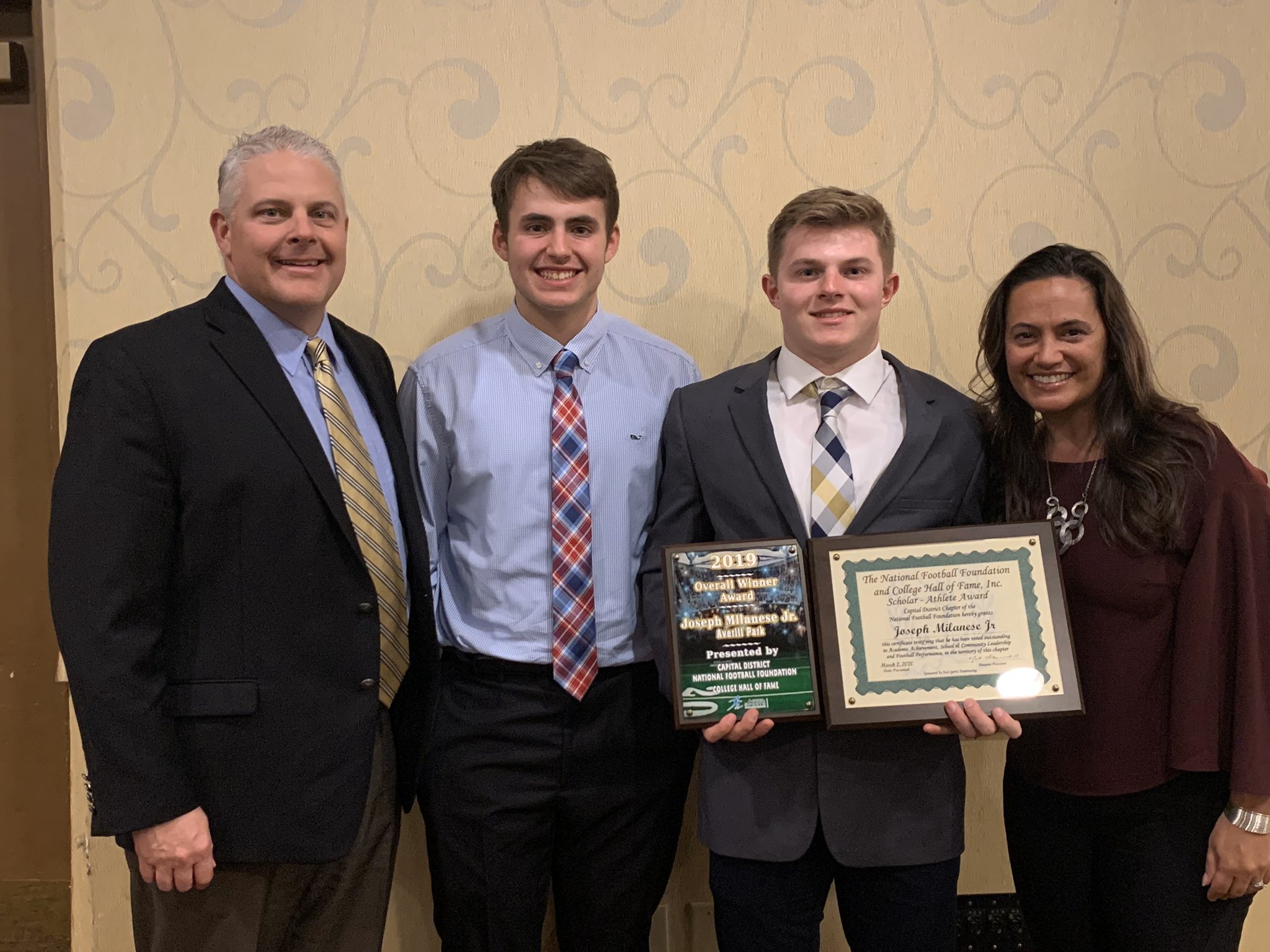Joe Milanese with awards