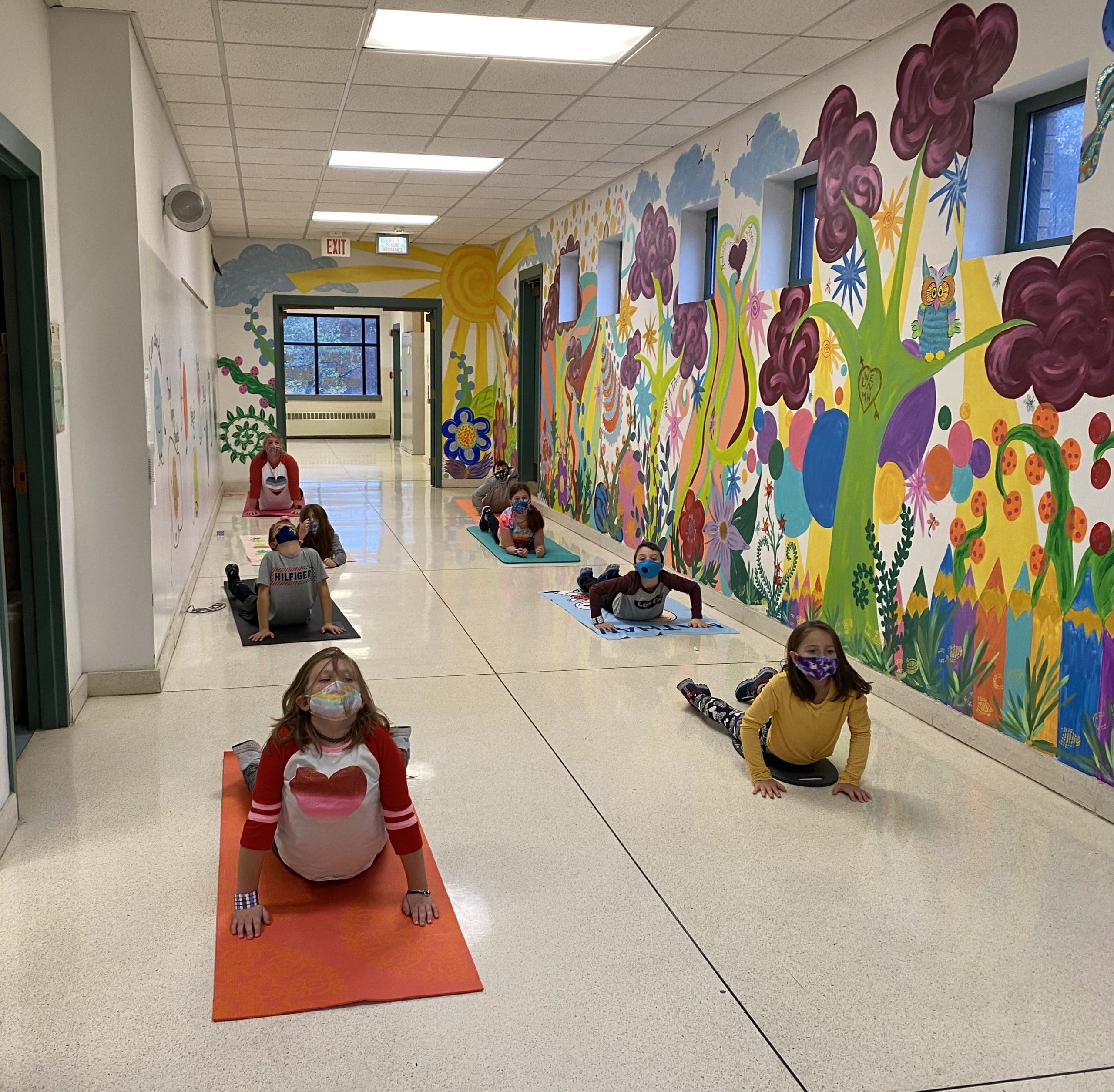 students doing yoga