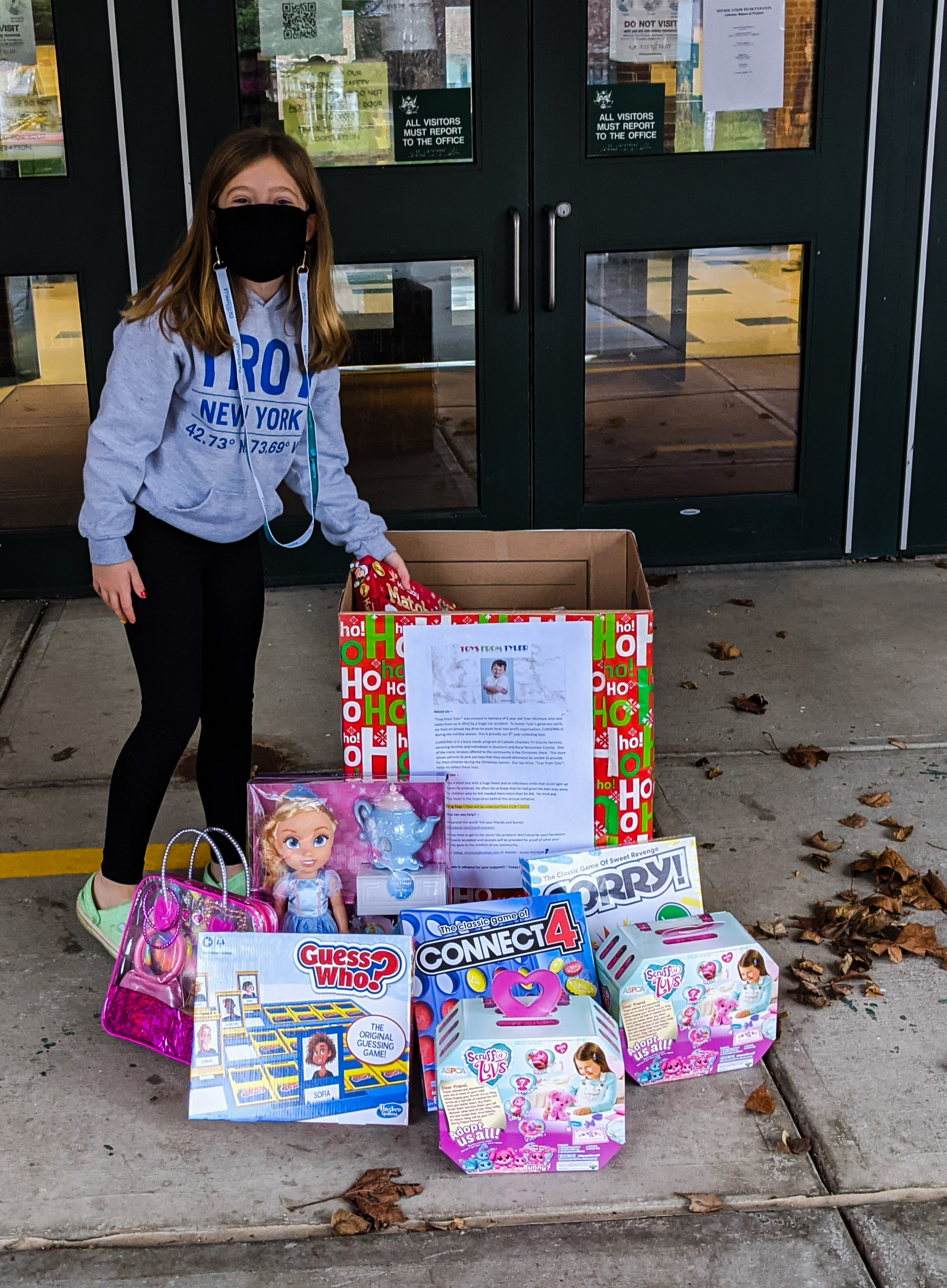student donating gifts