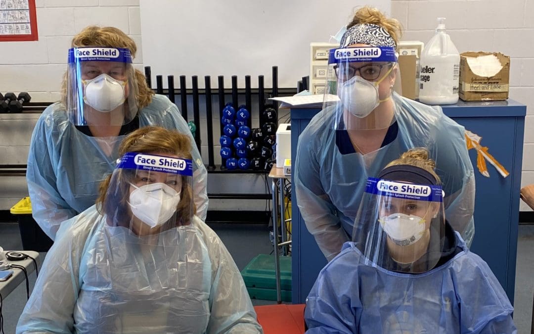 staff members ready to test for covid-19