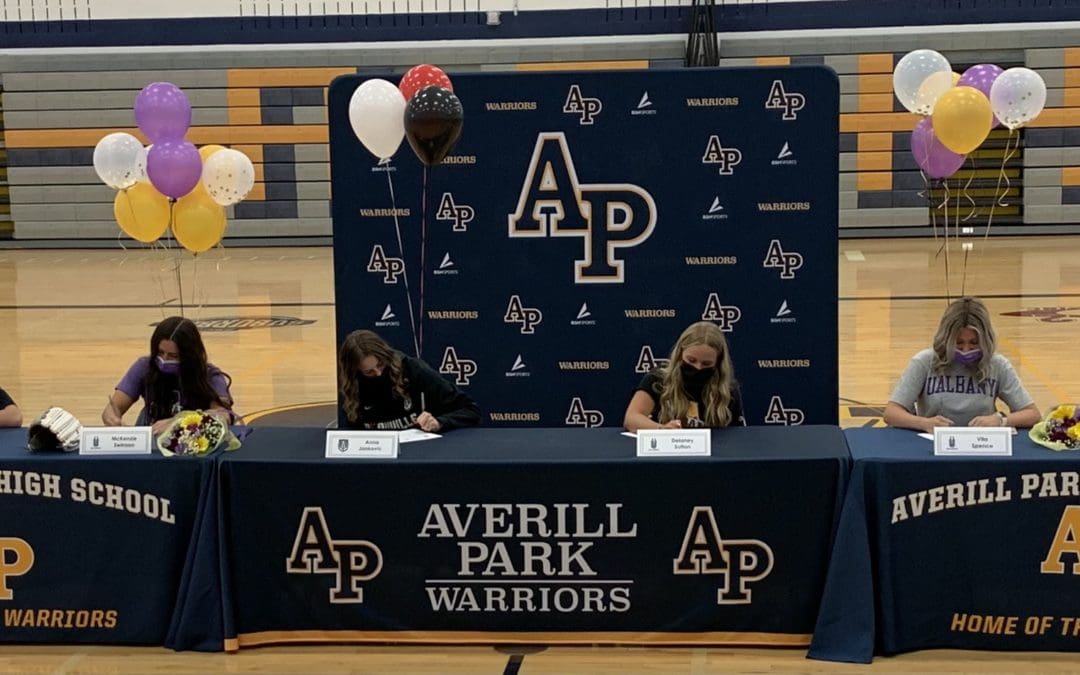 students signing letters