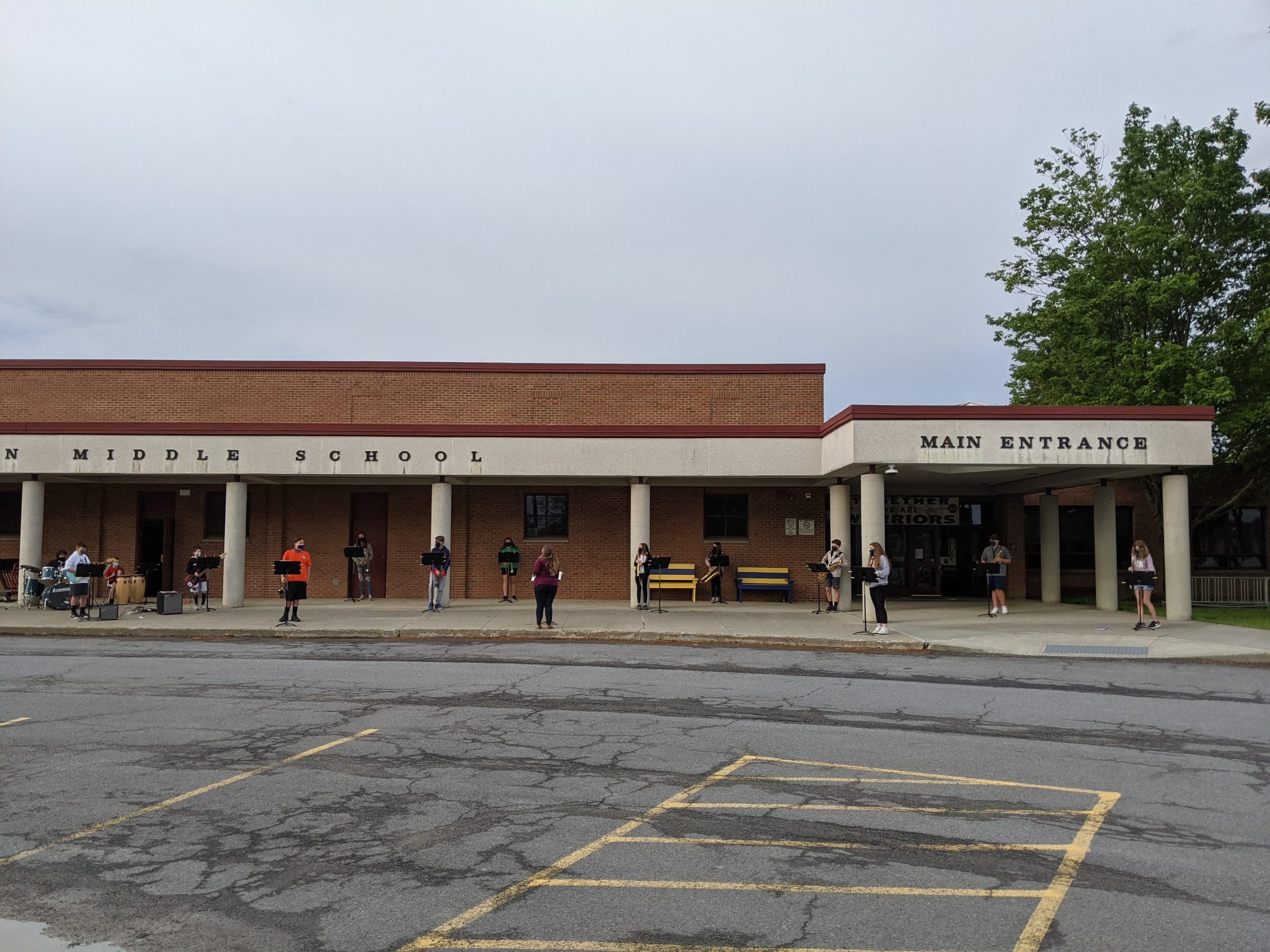 students performing outside