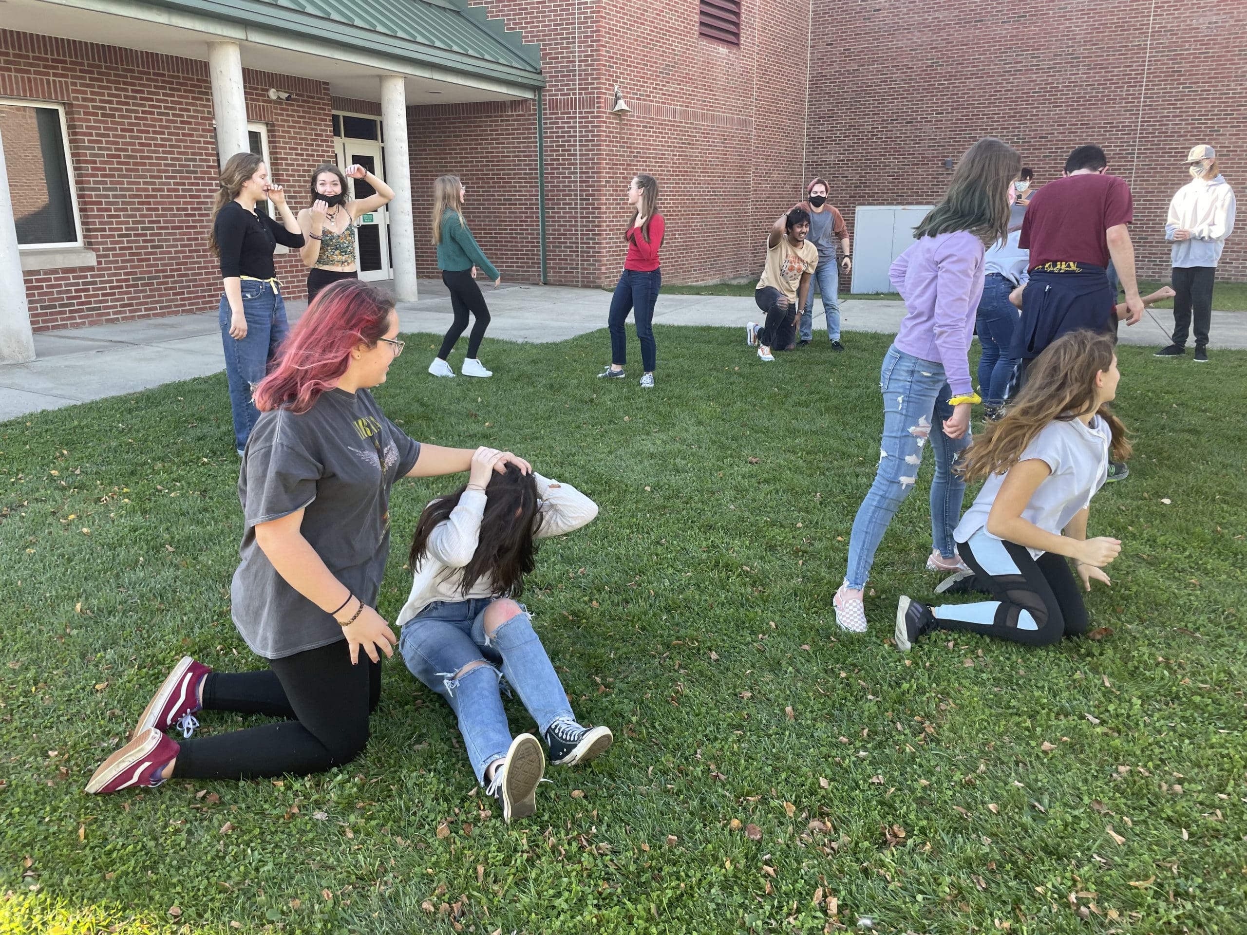 students practicing outside