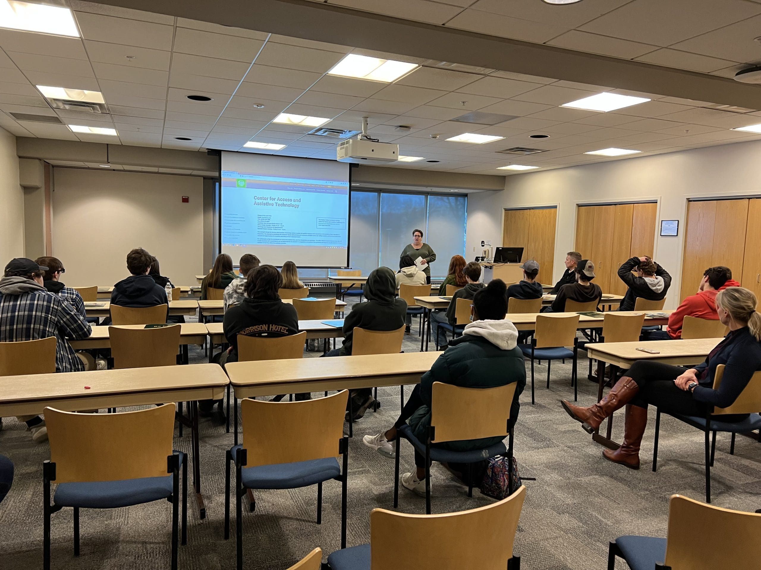 students listening to a speaker